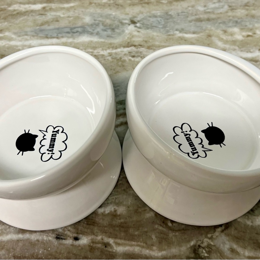 White Minimalist Circular Accents with Cartoon Design cat bowls